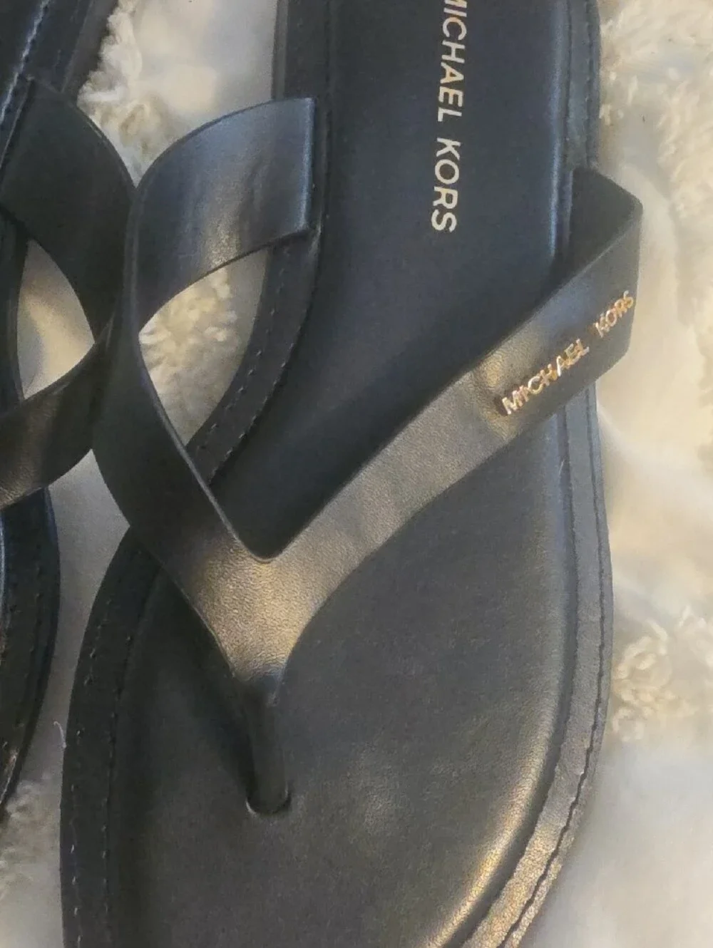 Michael Kors Black Slip-On Thong Sandals with Gold Logo